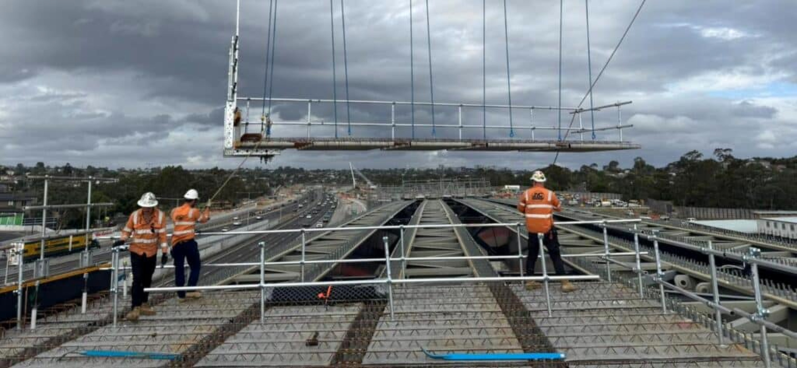 A Transfloor panel being crane lifted with NON-DRILL edge protection already fitted